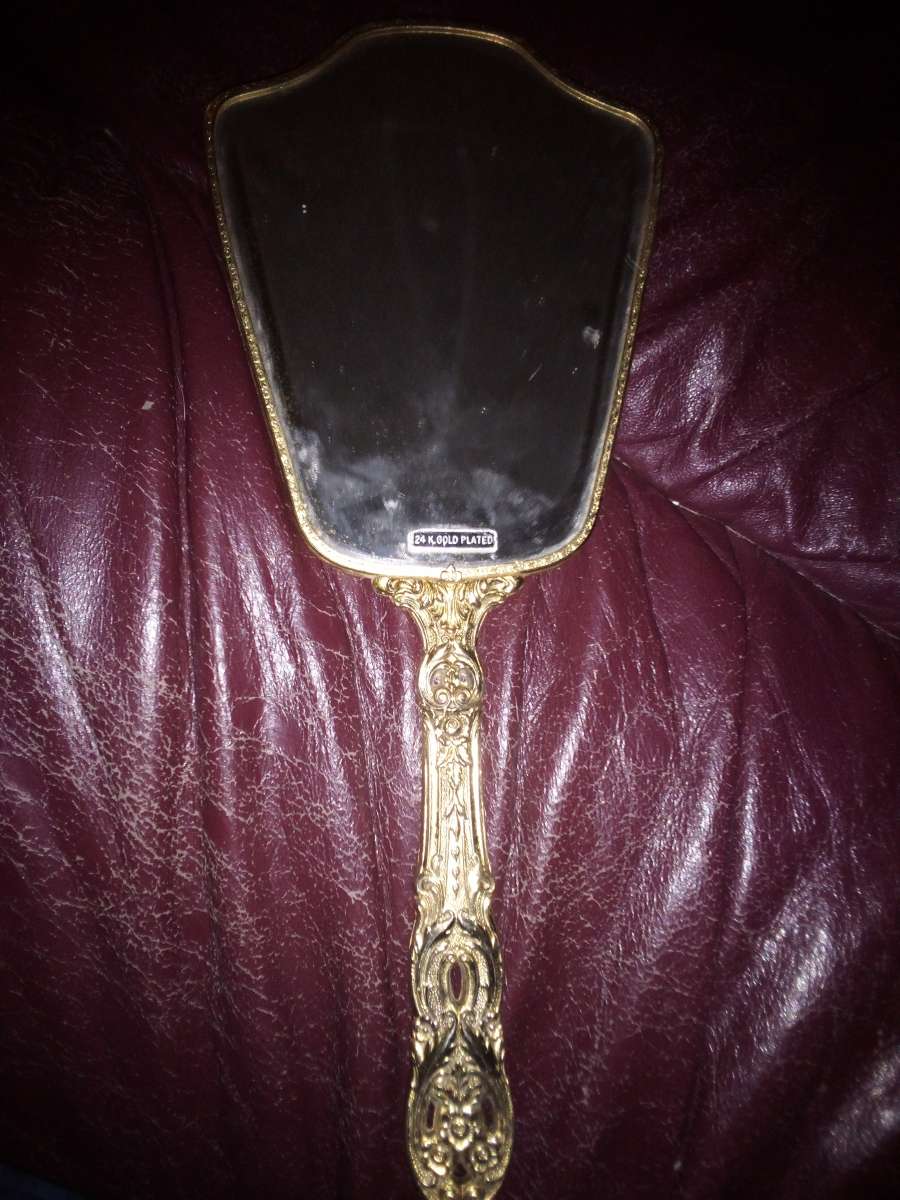 vintage hand held antique mirror
