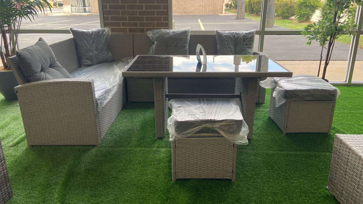 Patio sectional with gray cushions  we have delivery today 4