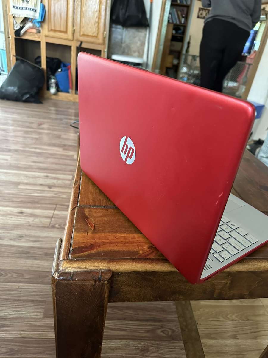15in red HP laptop