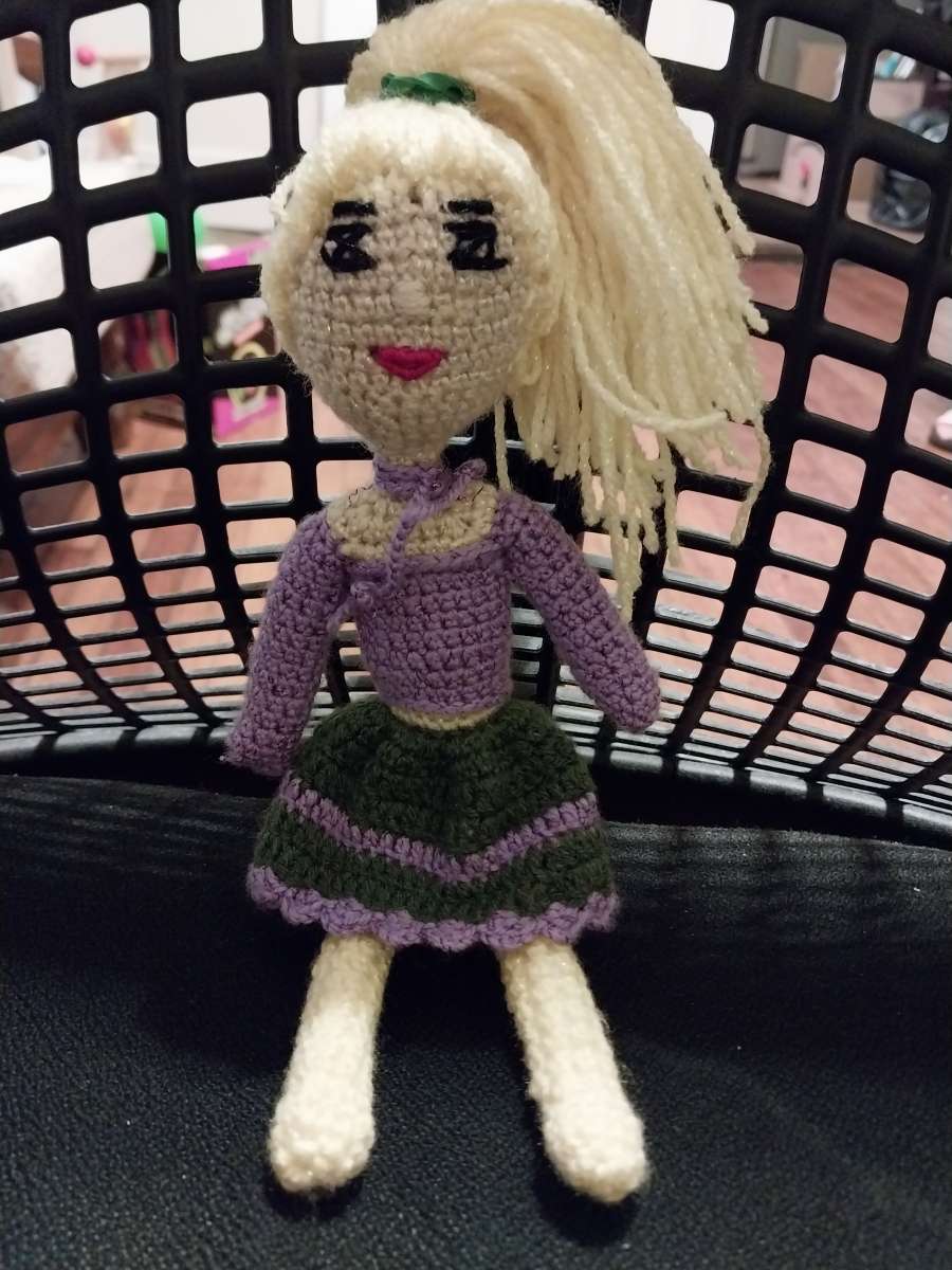 Handmade knitted doll