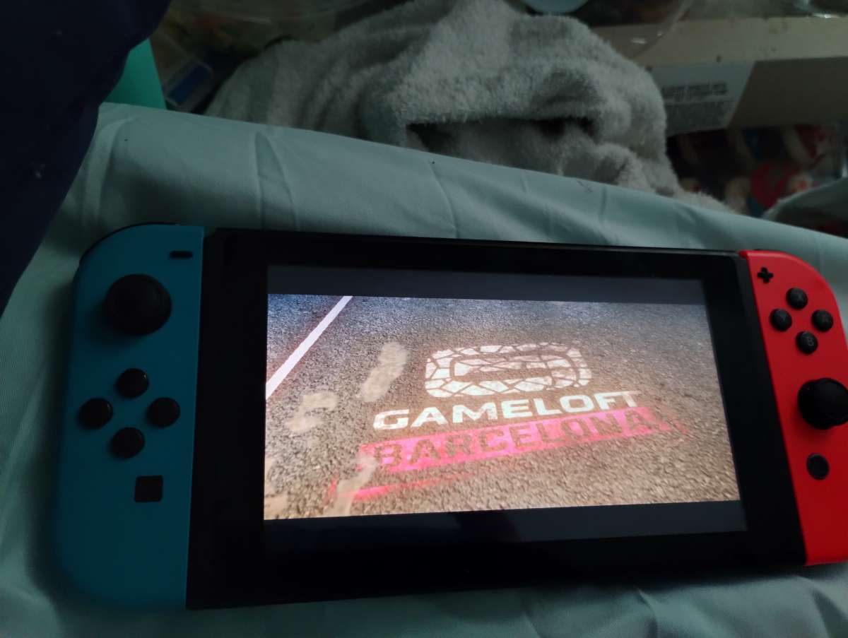 Nintendo switch neon red and blue and accessories