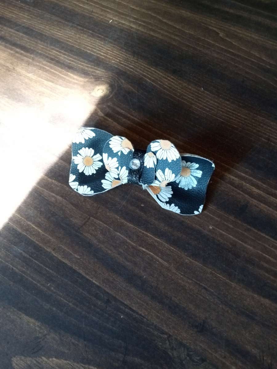 ribbon and fabric and leather hair or gift bows