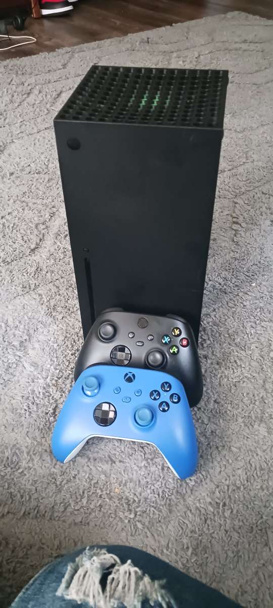 Xbox series x with controllers