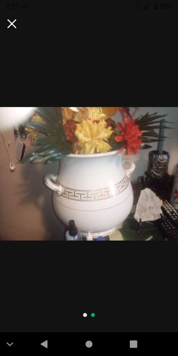 white and gold antique vase