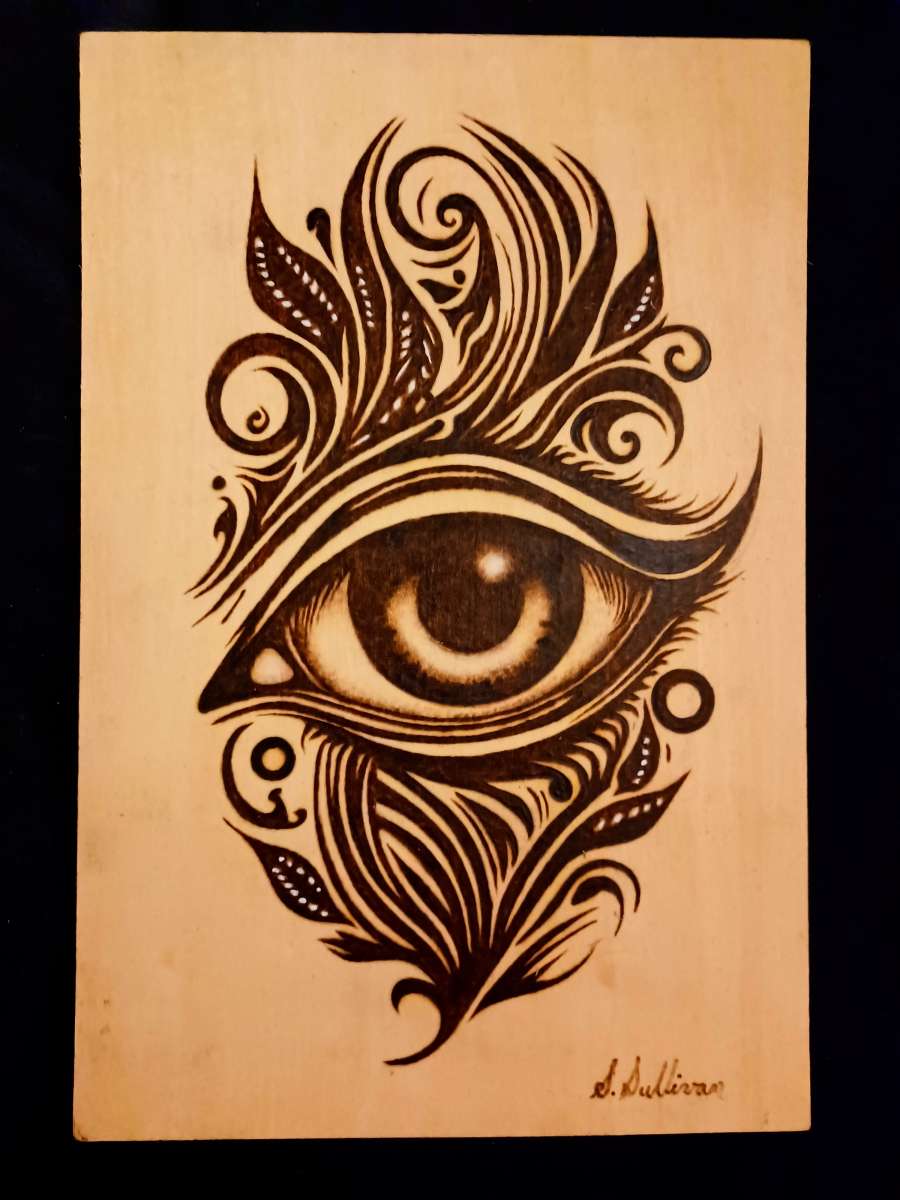 Portraits burned on wood