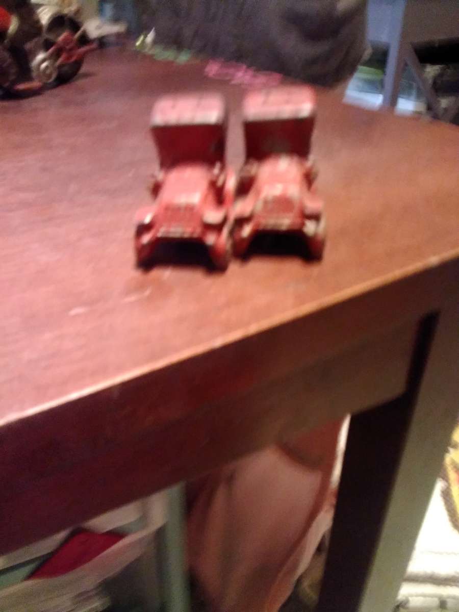 vintage red metal car salt and pepper shakers