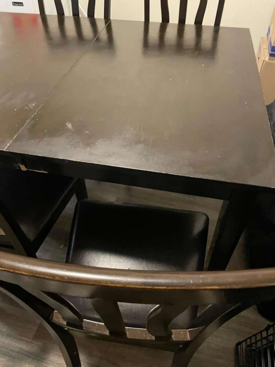 Table includes 5 chairs