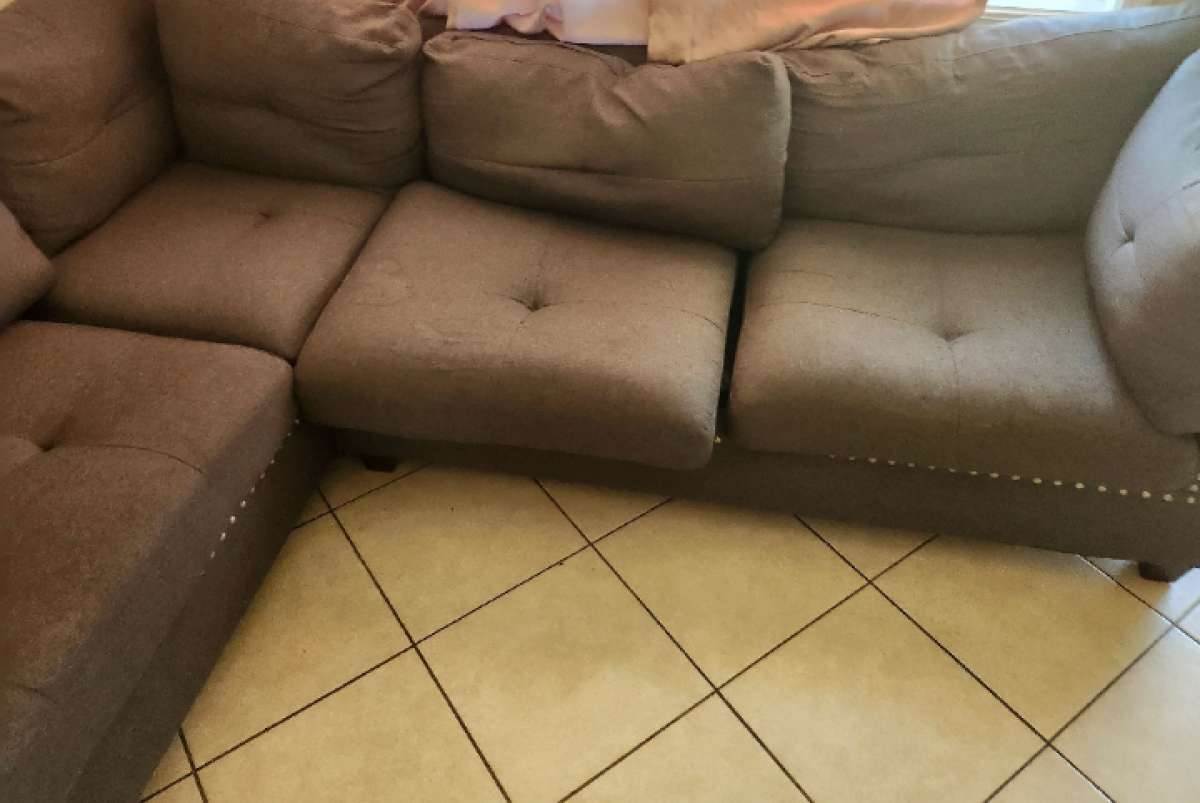 Grey sectional sofa with ottoman