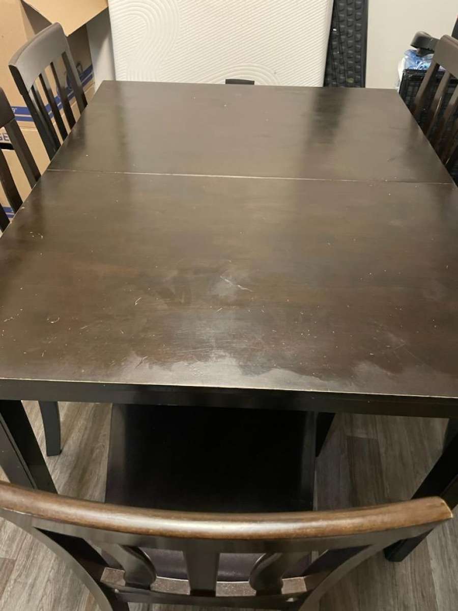 Table includes 5 chairs