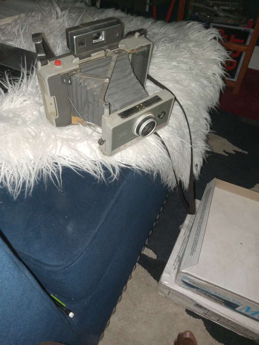 a vintage Polaroid camera