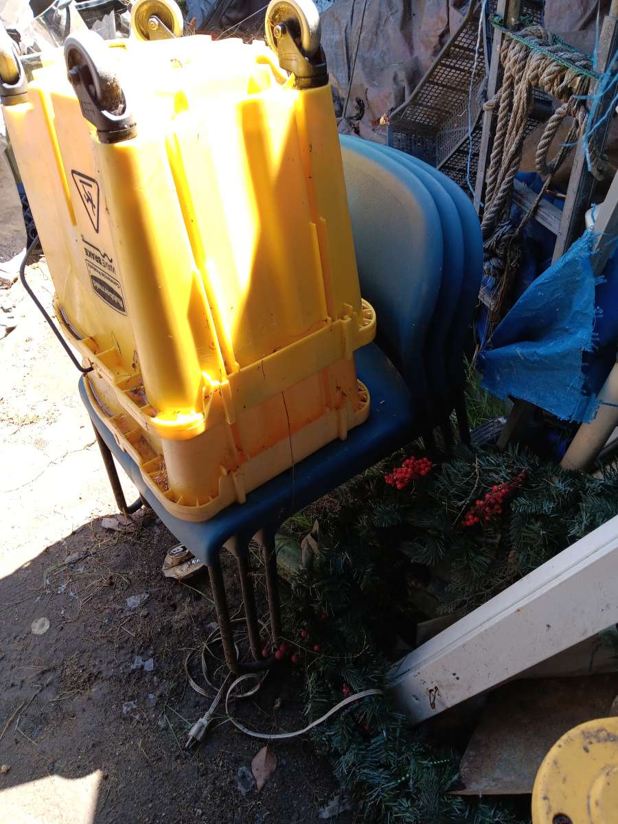 mop bucket and chairs