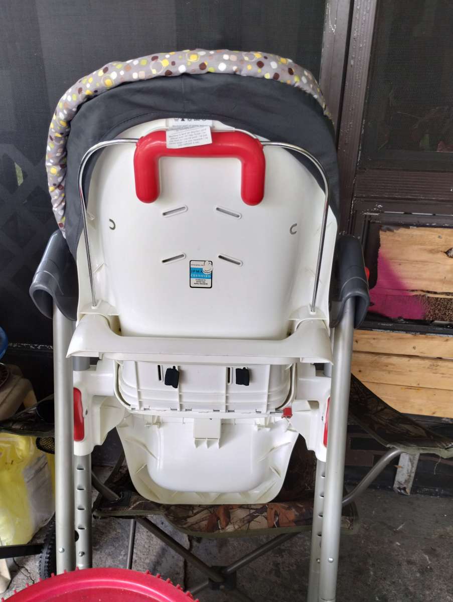 playpen and highchair