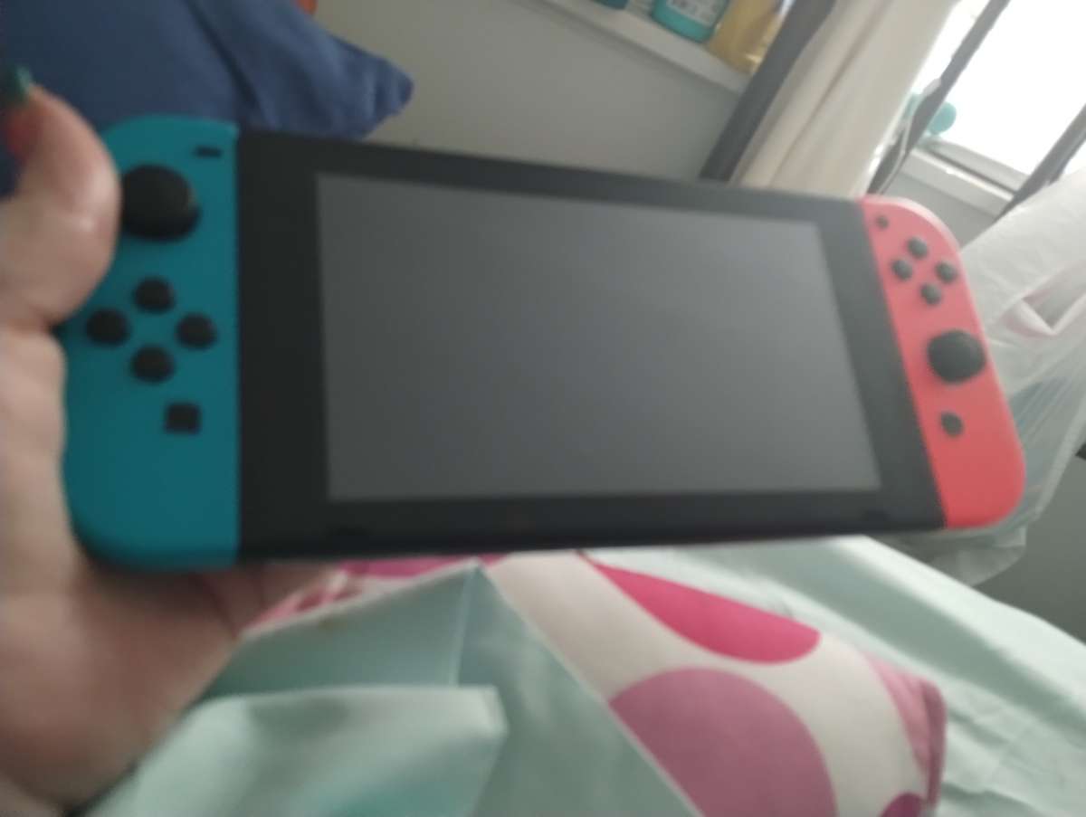 Nintendo switch neon red and blue and accessories