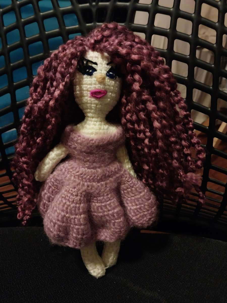 Handmade knitted doll