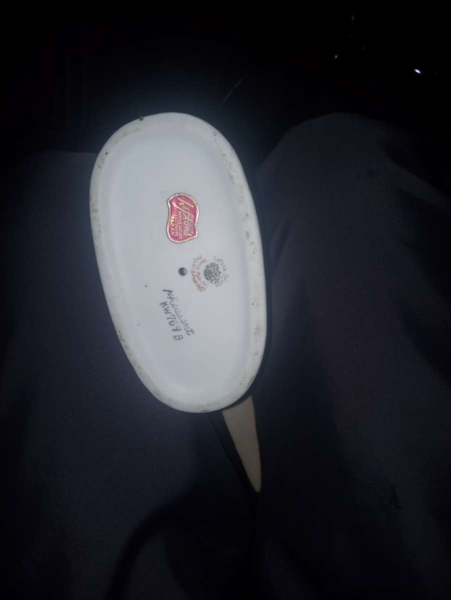 female pheasant statue