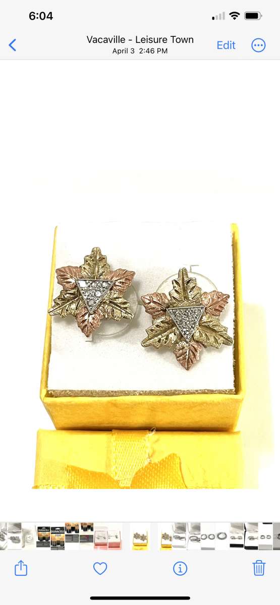 like new Pre owned solid gold diamond earrings