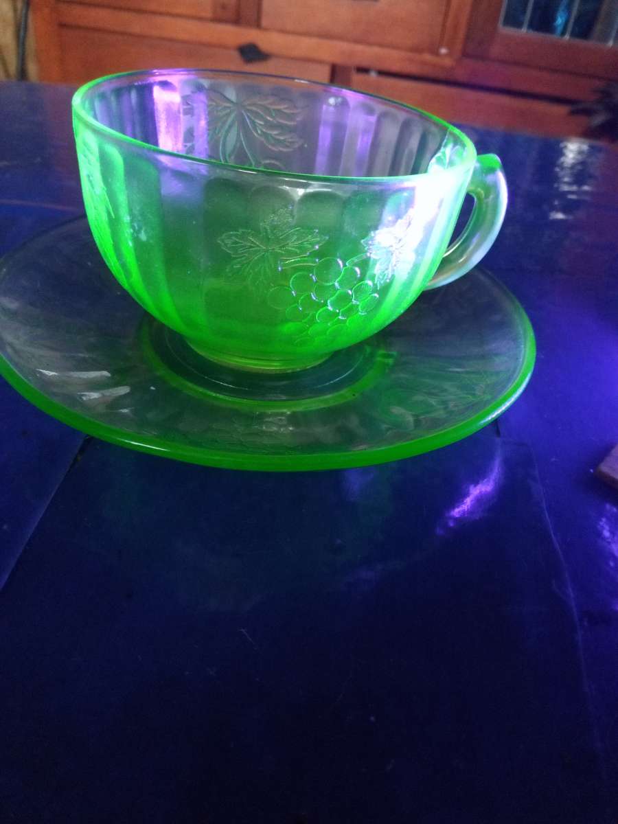 Hazel Atlas fruits uranium glass cup and saucer
