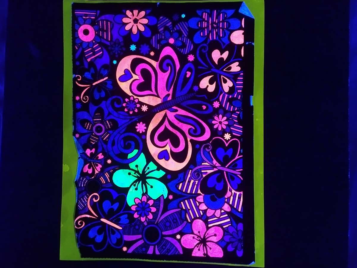 Hand made velvet posters that also glow in blacklight