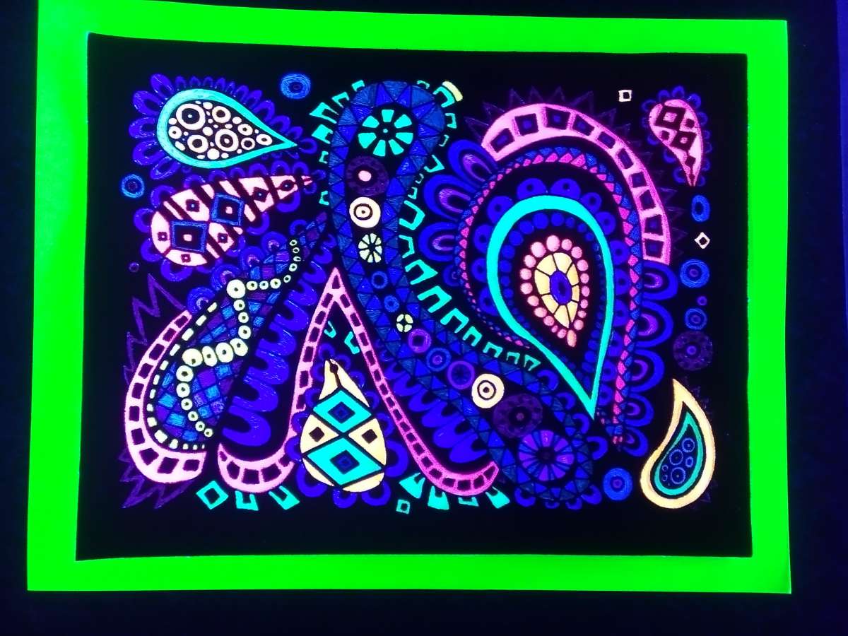 Hand made velvet posters that also glow in blacklight
