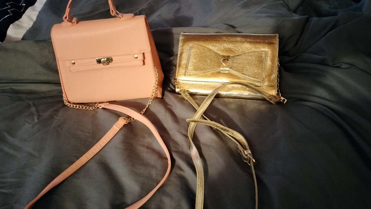 two hand bags iv never used selling both for 50 cash