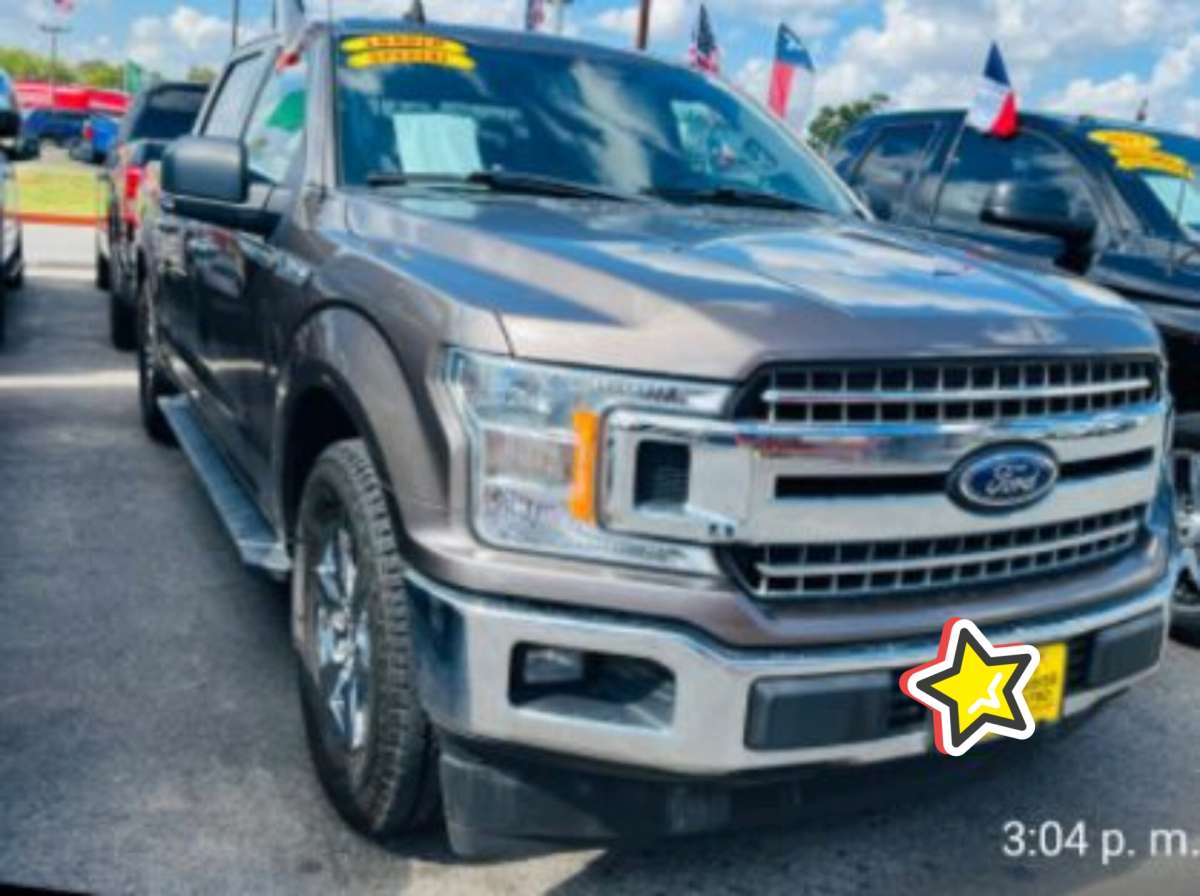 2018 FORD F150 XLT 118k millas