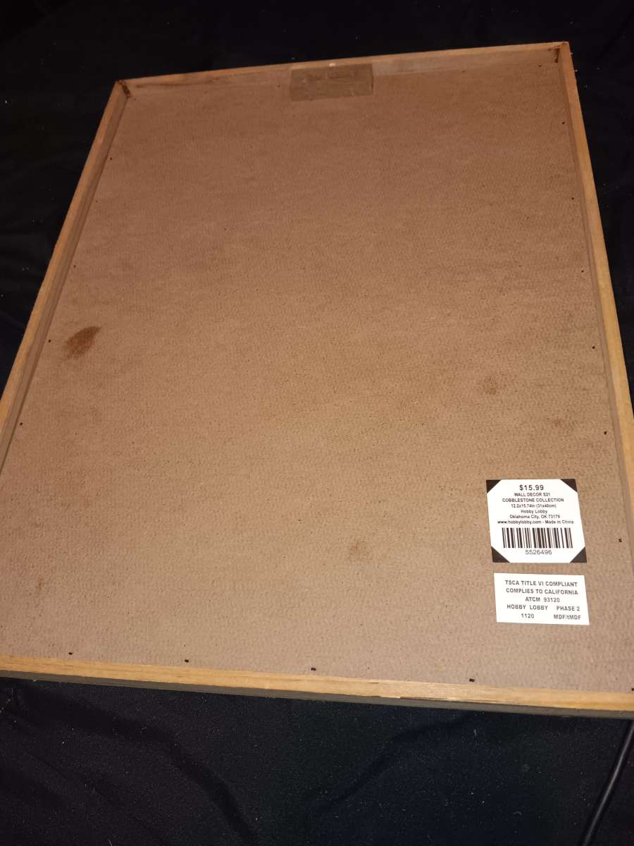 Wooden doorway framed painting