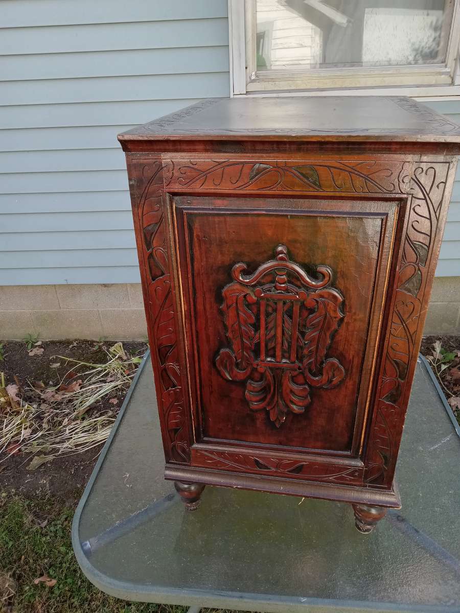 end table with storage ornate detailing
