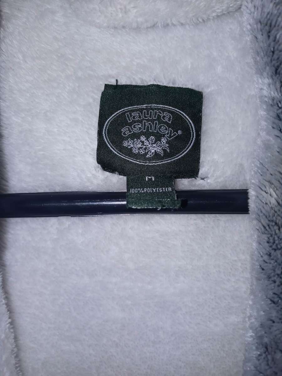 small medium robes white is Laura Ashley Greene is concierge