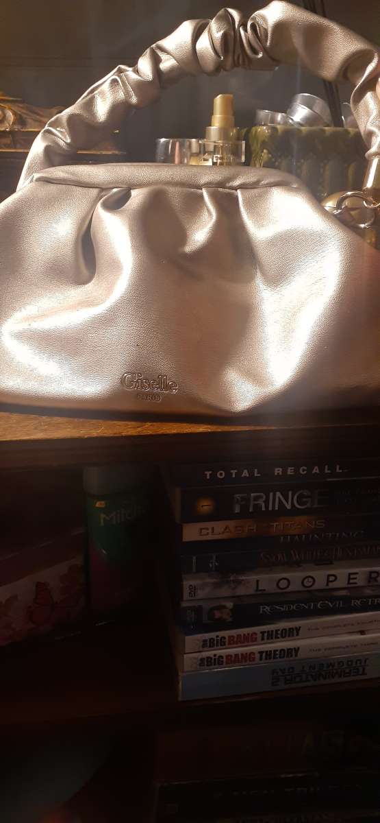 a genuine Giselle Paris purse