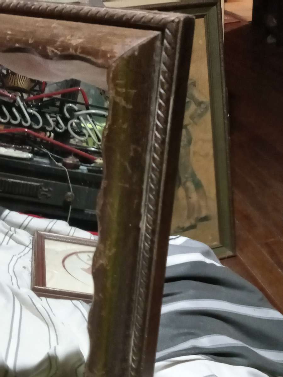 wood mirror ornate detailing