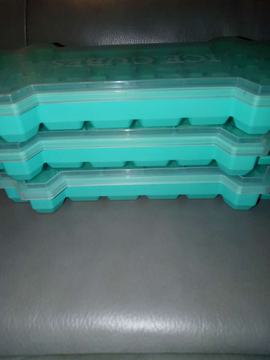 three honeycomb ice Cube mold trays with lids to regular ice