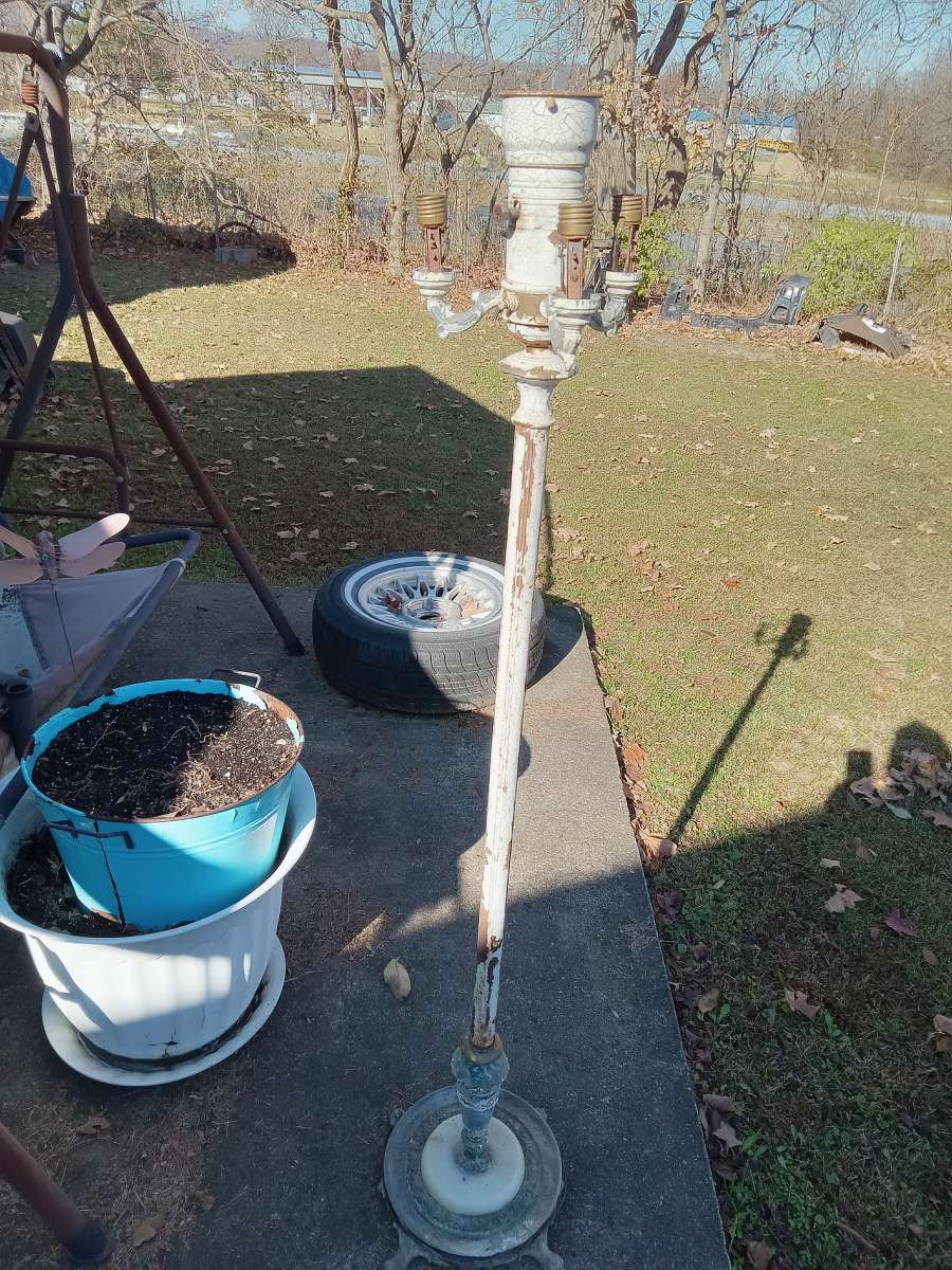antique floor lamp marble base has brass on it