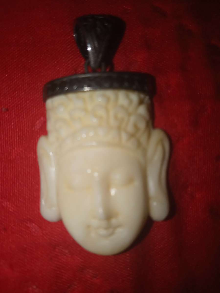 hand carved Buddha head pendant