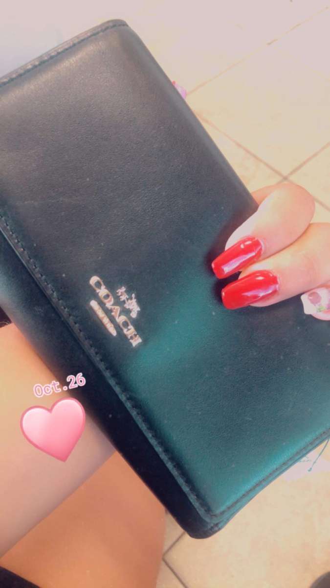 womans original wallet