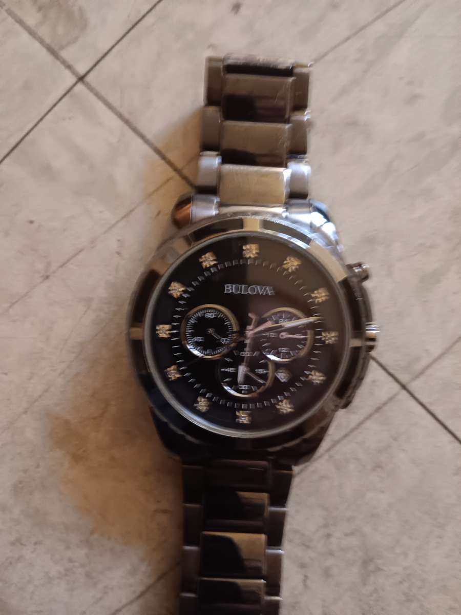 mens Bulova watch like new cost 499 new