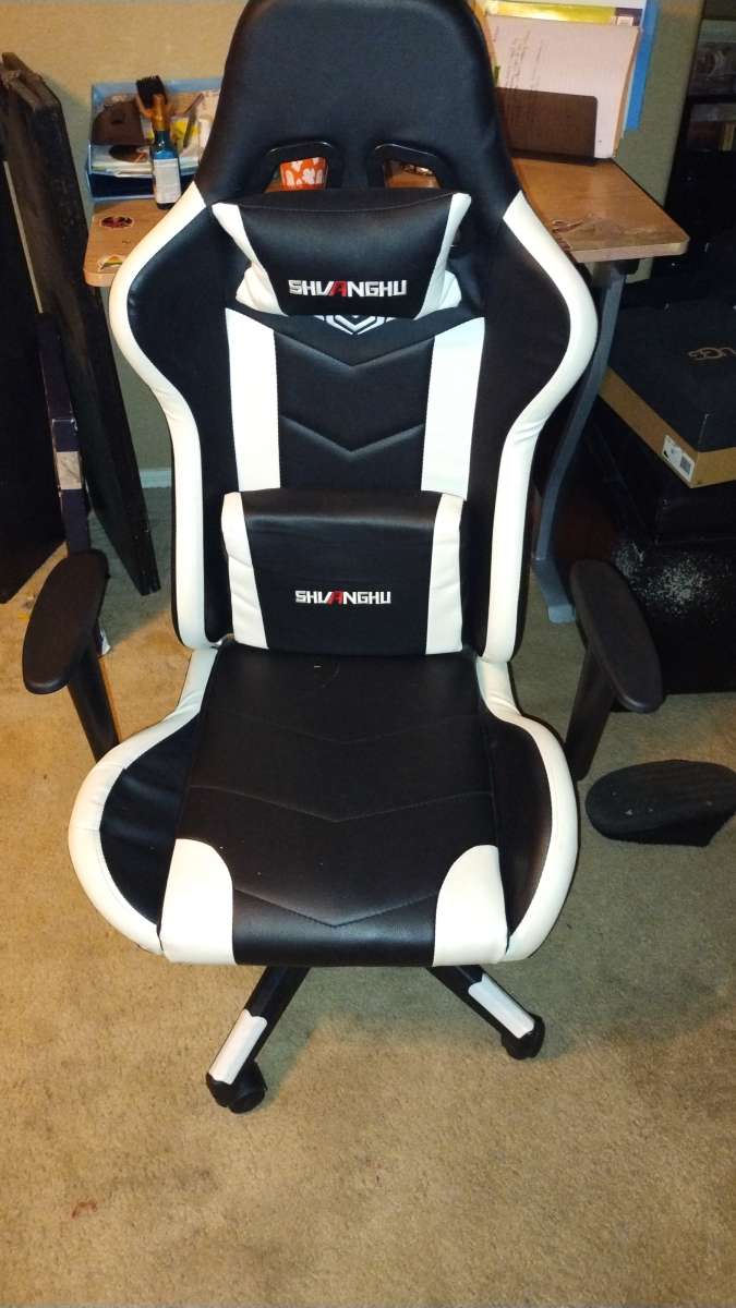 gaming chair and gaming steering wheel and pedals