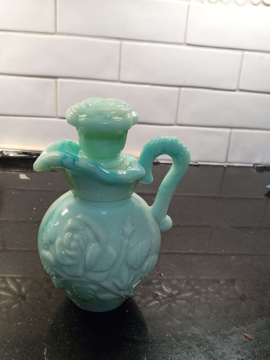 green blue swirl collective bottle