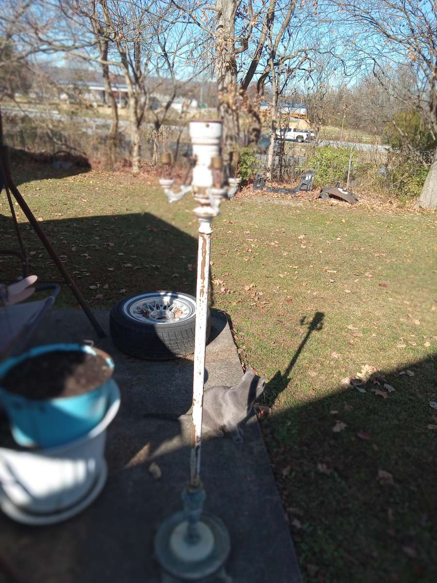 antique floor lamp marble base has brass on it