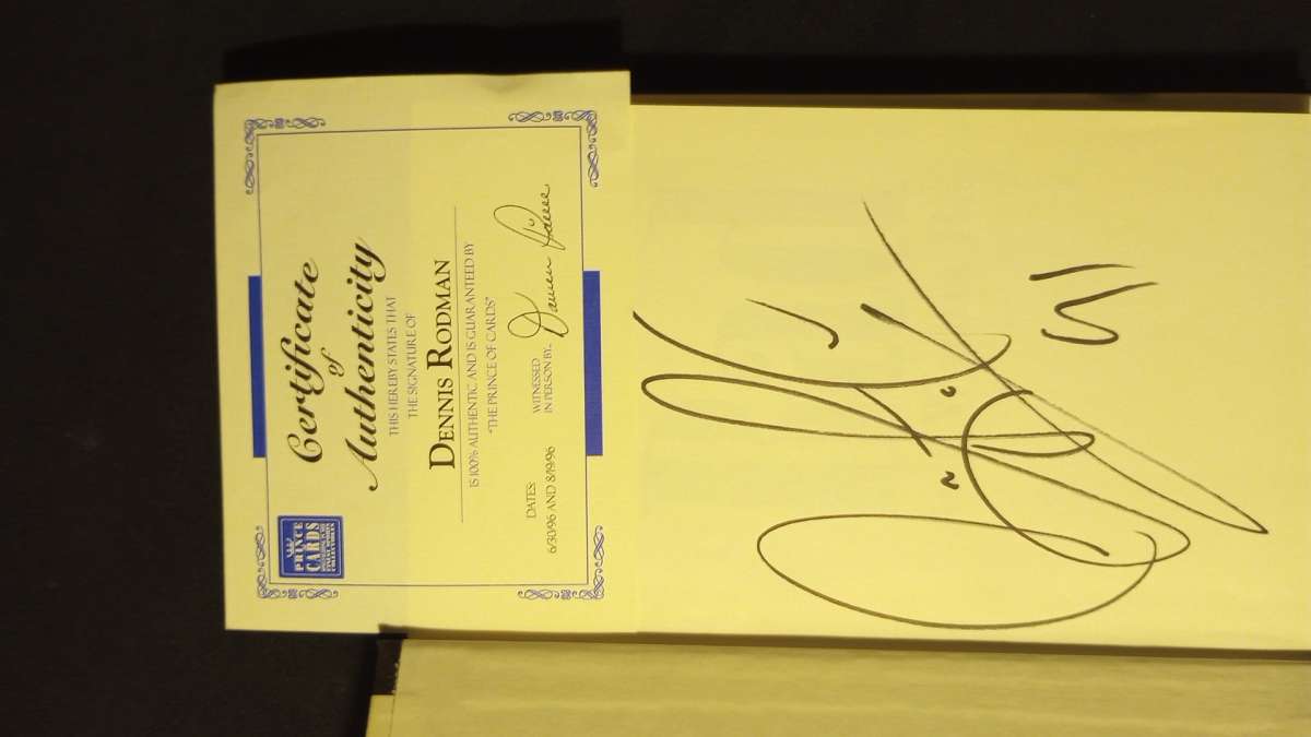 Autographed Signed with a picture of the book signing with C