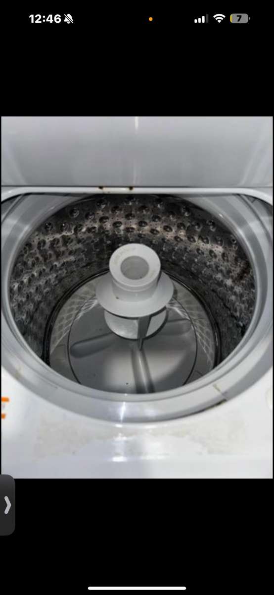 White GE laundry center Delivery Available