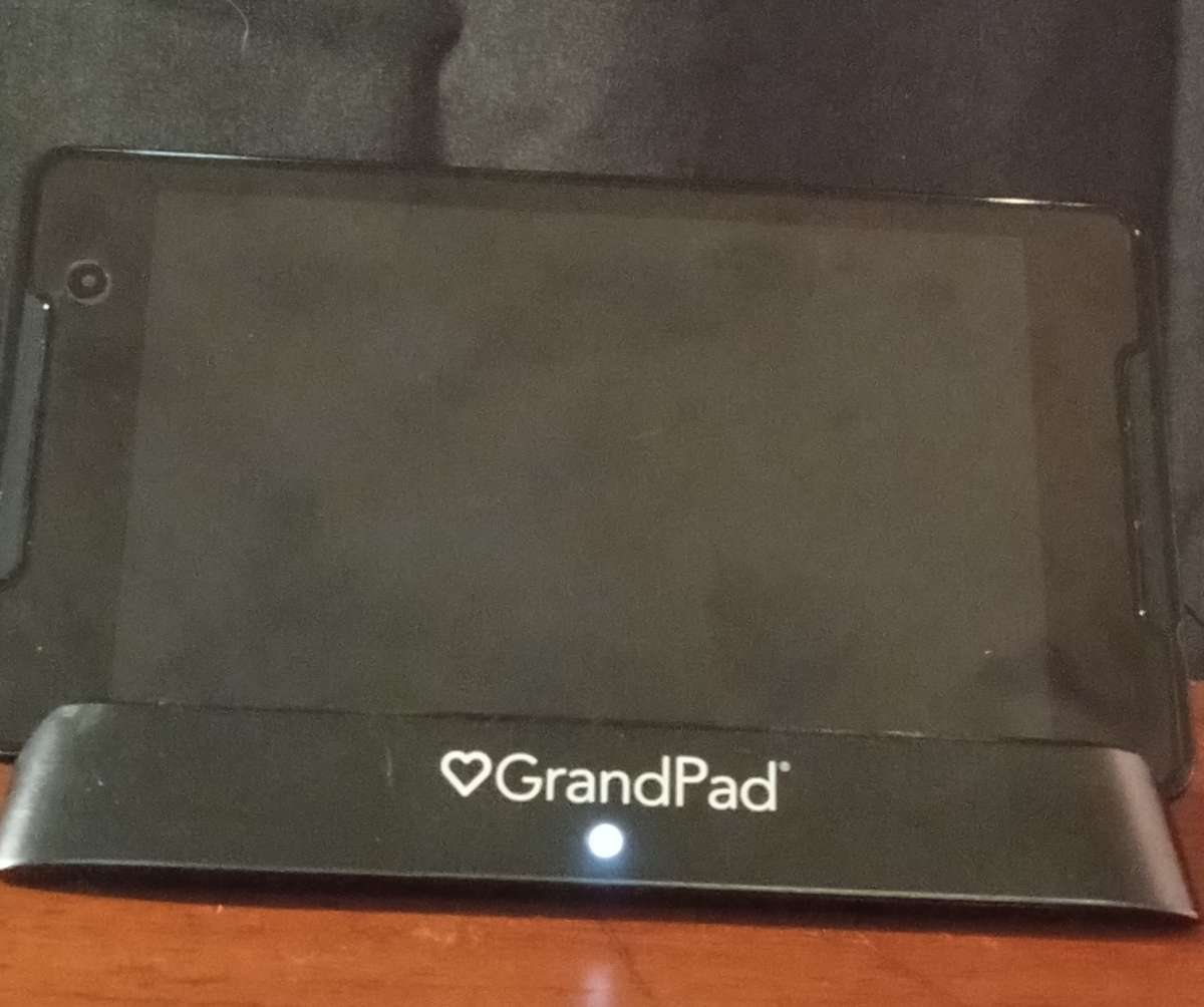 Grand pad tablet and cell phone with charging dock