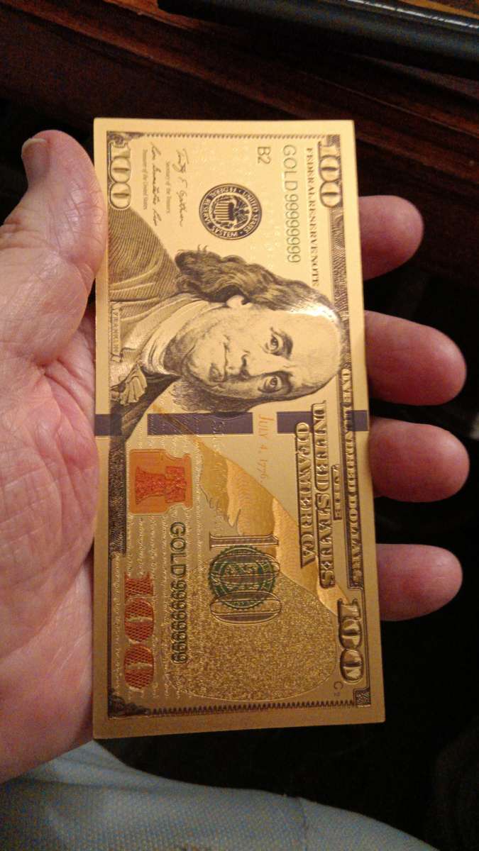 Set of Seven Commemorative Golden Bills covered with gold