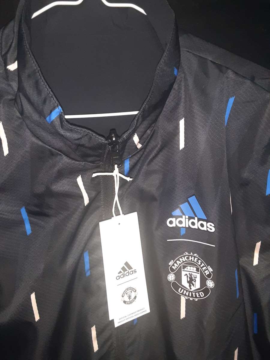 Manchester united jacket double side size xl