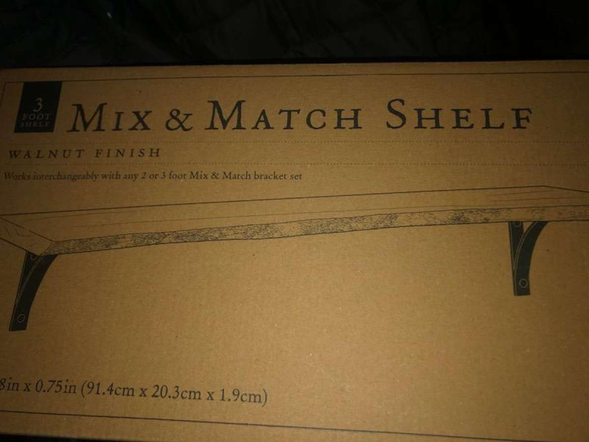 real wood shelves and brackets also sagavieh area rug