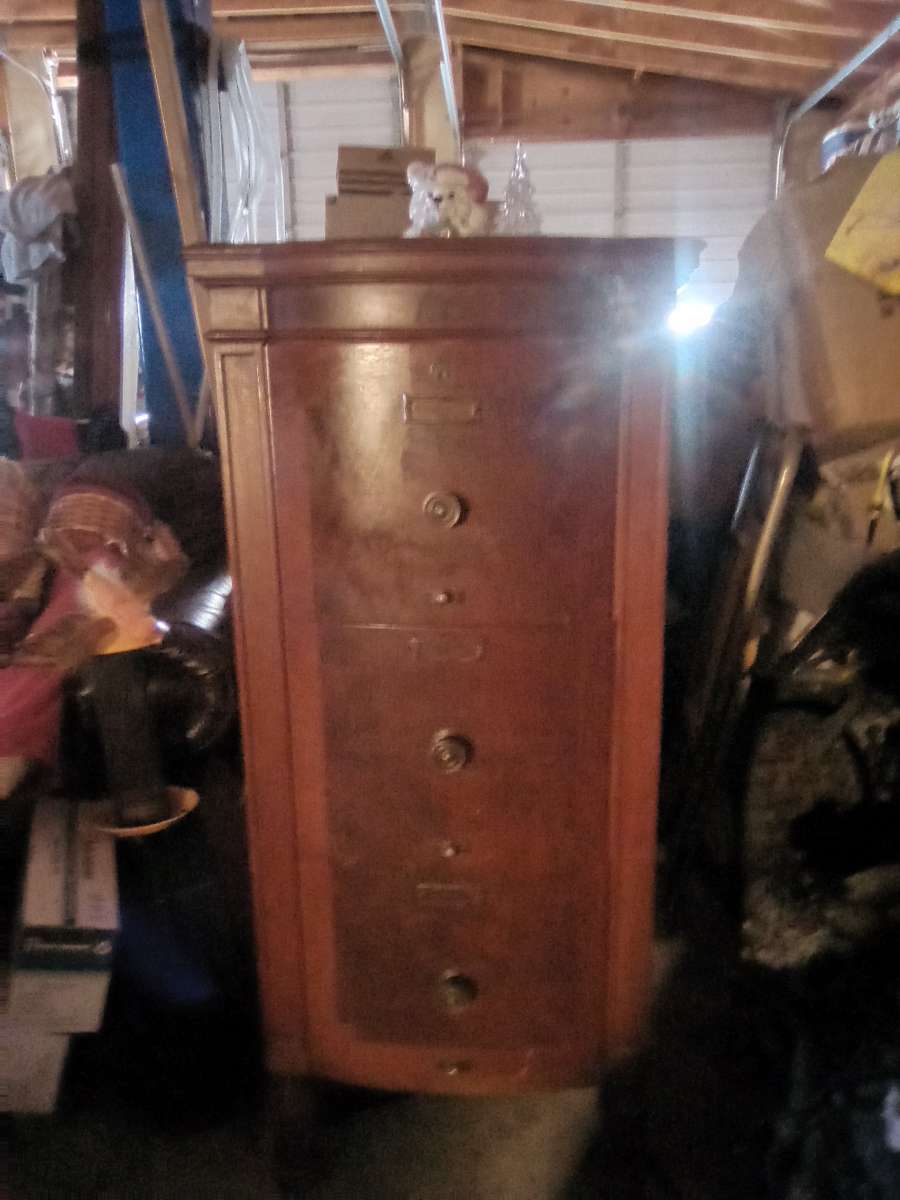 antique late 1800s tongue and groove file cabinet has 4 file