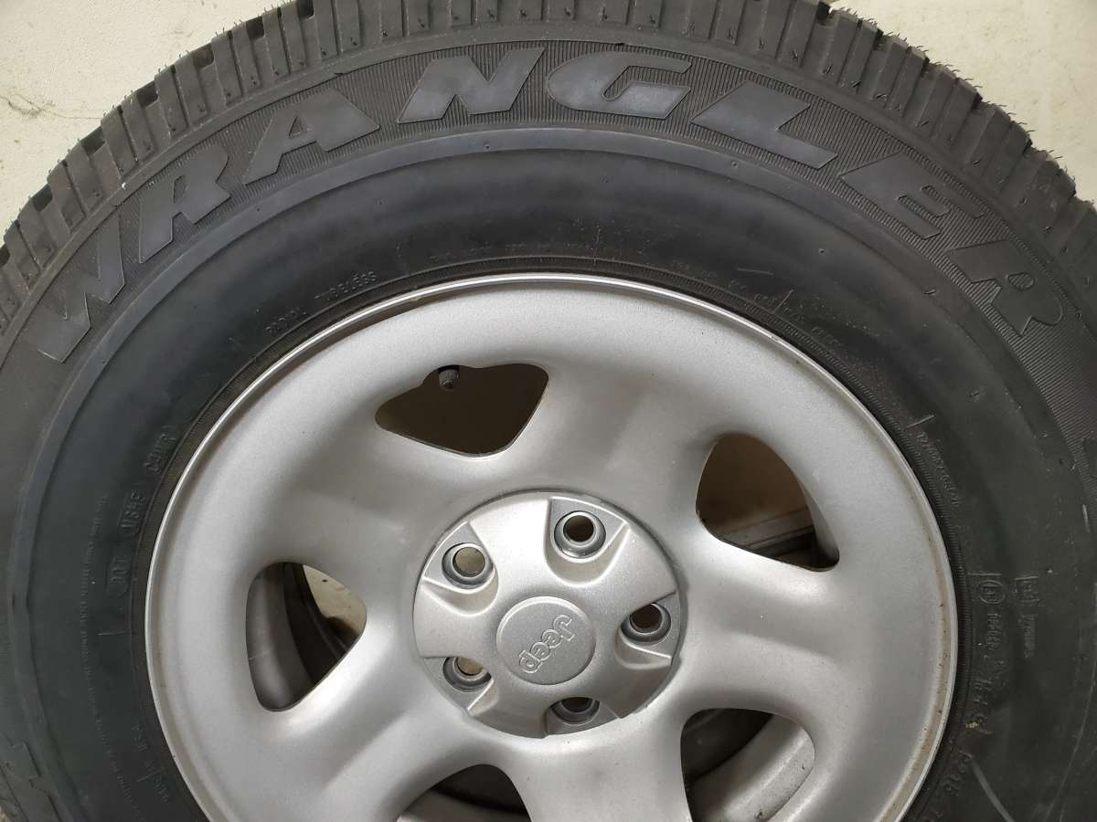 Jeep Wheel With New Goodyear Wrangler 21575 R15 Tire