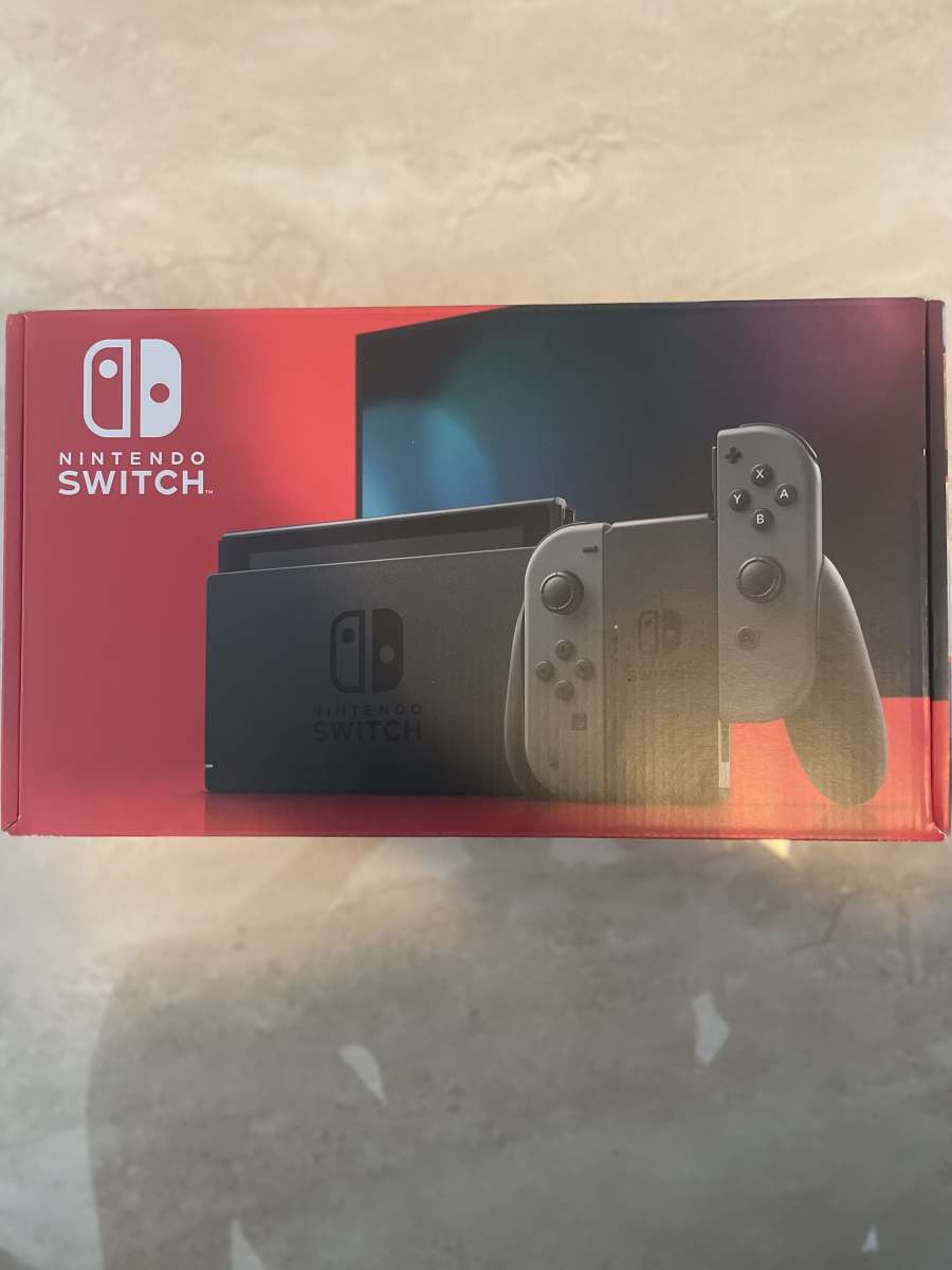 Nintendo switch with Neon blue and Neon red Joycon