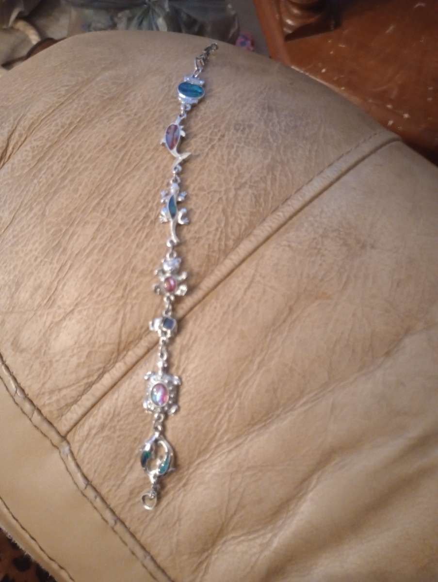 both bracelets one is like a goldfish and another one is lik