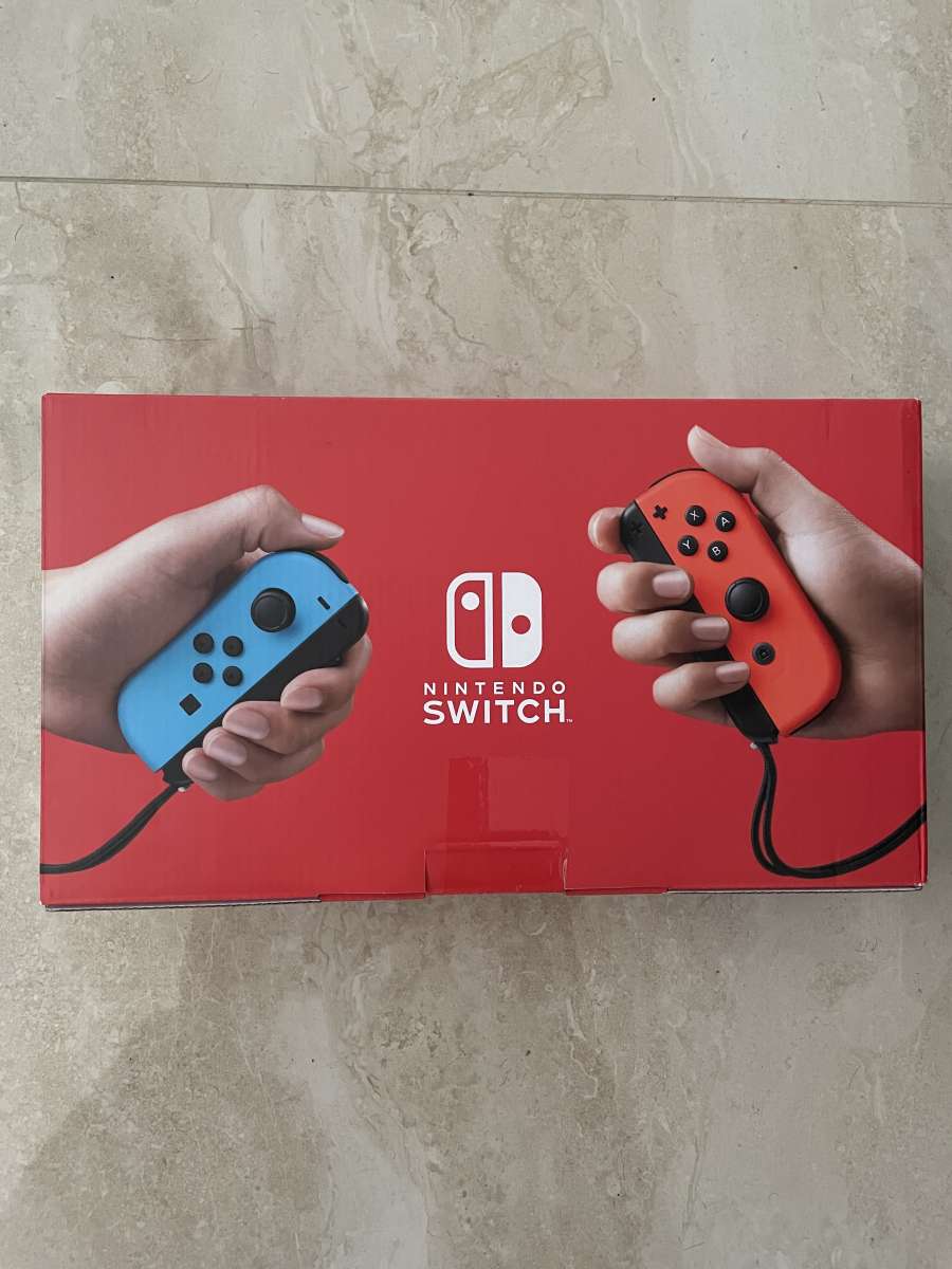 Nintendo switch with Neon blue and Neon red Joycon