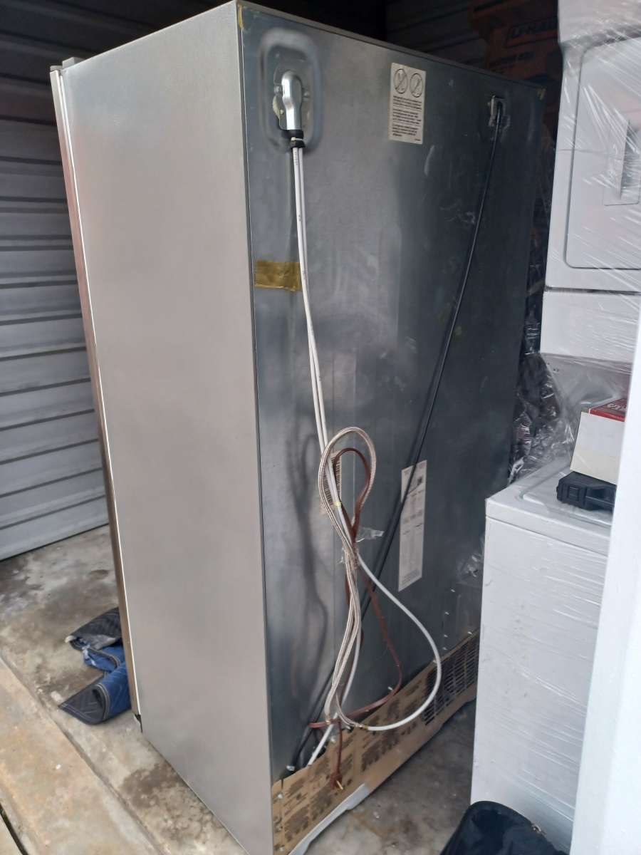 fridge washer dryer combo and fire place TV stand